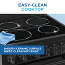 Black ceramic cooktop electric range with smooth glass surface and cleaning cloth