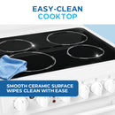 Smooth ceramic glass cooktop on white electric range with cleaning cloth