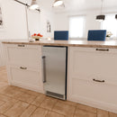 Undercounter ice maker with stainless door and base vent, built into cabinet space