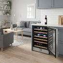 Dual-zone wine cooler with glass door open, showing blue-lit bottle shelves