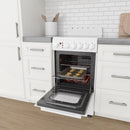 White electric range with oven open and cookies baking on the racks.