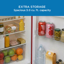 Interior refrigerator shelves with jars, bottles, and canned drinks