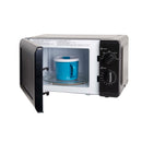 White countertop microwave oven with open door and visible mechanical control dials